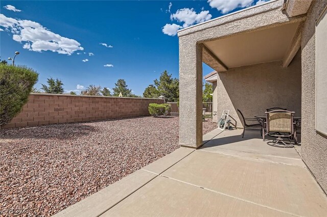 1816 Eagle Mesa Ave, Henderson, NV 89012 - fenced backyard featuring a patio area and outdoor dining area
