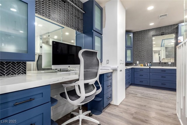 6351 Abacus Farms Ct, Las Vegas, NV 89131 - home office featuring built in desk, light wood-type flooring, and recessed lighting