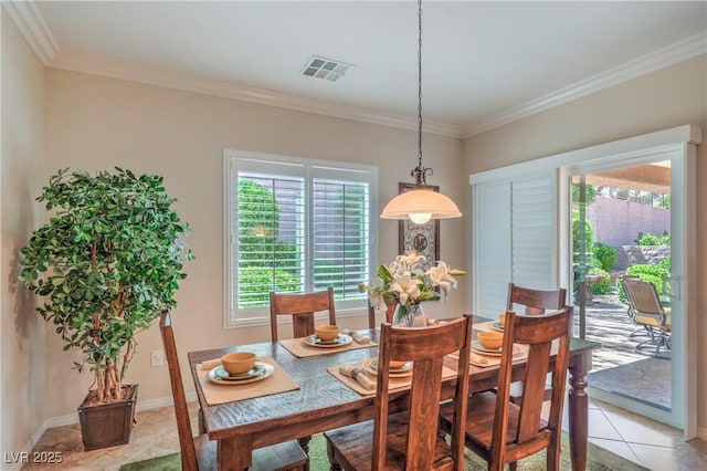 2225 Blackburn Hills Ave, Henderson, NV 89044 - dining area featuring crown molding and light tile patterned floors
