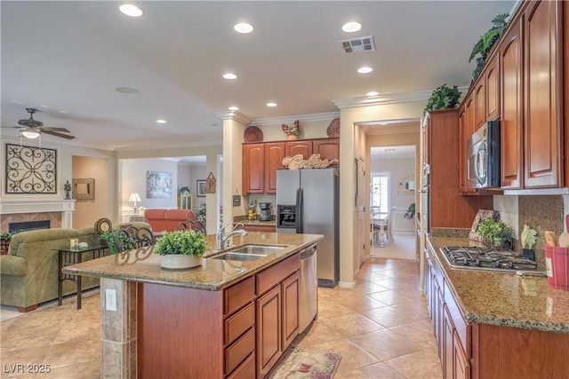 2225 Blackburn Hills Ave, Henderson, NV 89044 - kitchen featuring stainless steel appliances, ornamental molding, a ceiling fan, recessed lighting, and light stone countertops