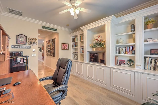 2225 Blackburn Hills Ave, Henderson, NV 89044 - office space featuring a ceiling fan, crown molding, and light wood-style floors