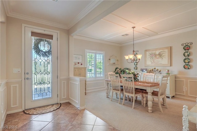 2225 Blackburn Hills Ave, Henderson, NV 89044 - dining area with healthy amount of natural light, a decorative wall, coffered ceiling, a chandelier, and crown molding