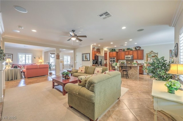 2225 Blackburn Hills Ave, Henderson, NV 89044 - living room with crown molding, light tile patterned floors, a ceiling fan, and recessed lighting