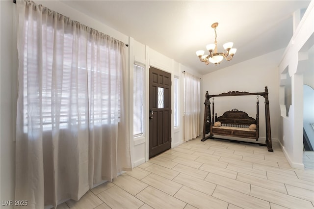 4530 W Shelbourne Ave, Las Vegas, NV 89139 - foyer featuring a chandelier and vaulted ceiling