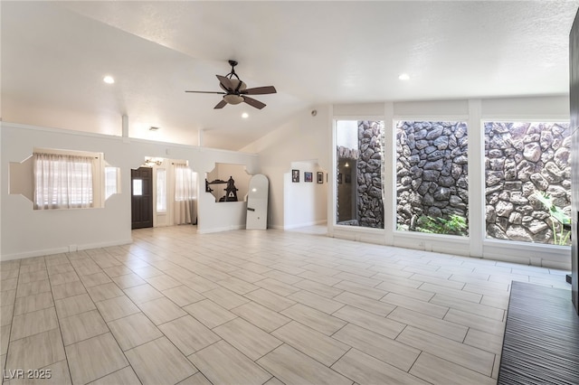 4530 W Shelbourne Ave, Las Vegas, NV 89139 - unfurnished living room featuring a ceiling fan and vaulted ceiling