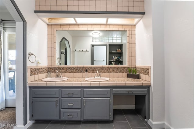 4530 W Shelbourne Ave, Las Vegas, NV 89139 - full bath with tasteful backsplash, double vanity, and tile patterned flooring