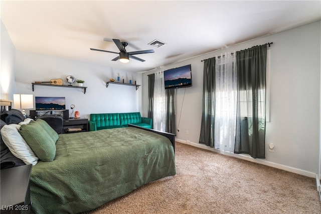 4530 W Shelbourne Ave, Las Vegas, NV 89139 - carpeted bedroom with a ceiling fan and baseboards