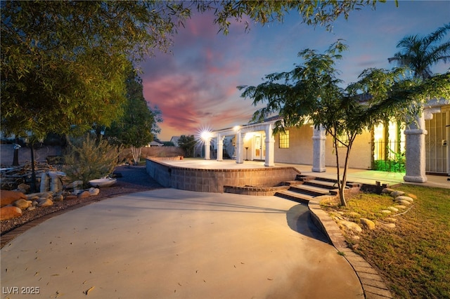 4530 W Shelbourne Ave, Las Vegas, NV 89139 - view of front of home featuring a patio and stucco siding