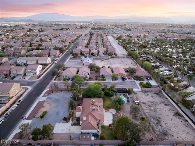 4530 W Shelbourne Ave, Las Vegas, NV 89139 - aerial view at dusk of a mountain view and a residential view