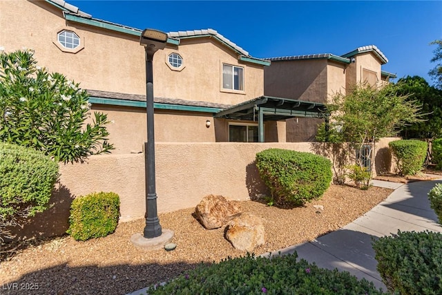 5249 Wave Dancer Ln, Las Vegas, NV 89118 - view of front facade with stucco siding