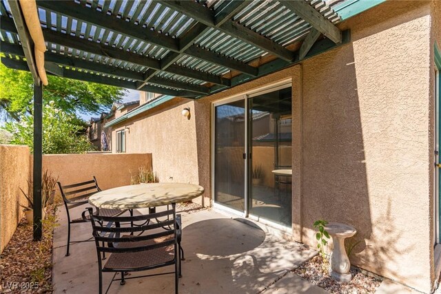 5249 Wave Dancer Ln, Las Vegas, NV 89118 - view of patio with a pergola and outdoor dining area