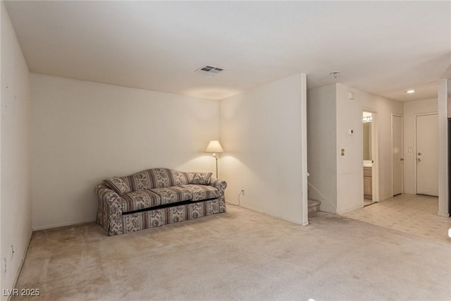 5249 Wave Dancer Ln, Las Vegas, NV 89118 - sitting room with carpet flooring, stairs, and recessed lighting