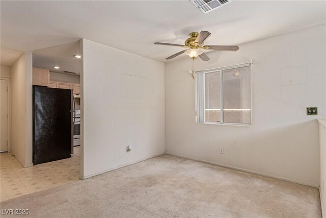 5249 Wave Dancer Ln, Las Vegas, NV 89118 - empty room with a ceiling fan, light colored carpet, and recessed lighting
