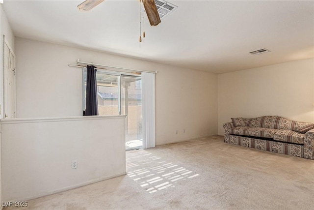 5249 Wave Dancer Ln, Las Vegas, NV 89118 - unfurnished living room with carpet and a ceiling fan