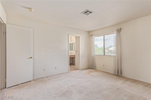 5249 Wave Dancer Ln, Las Vegas, NV 89118 - unfurnished bedroom with carpet flooring and connected bathroom