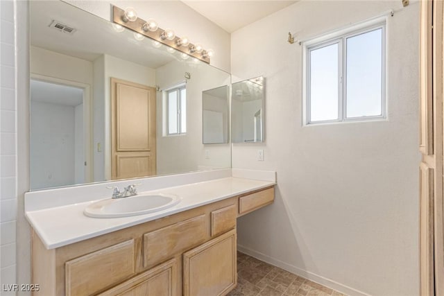 5249 Wave Dancer Ln, Las Vegas, NV 89118 - bathroom featuring vanity and baseboards
