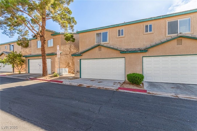 5249 Wave Dancer Ln, Las Vegas, NV 89118 - view of property featuring stucco siding