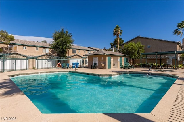 5249 Wave Dancer Ln, Las Vegas, NV 89118 - community pool with a patio area