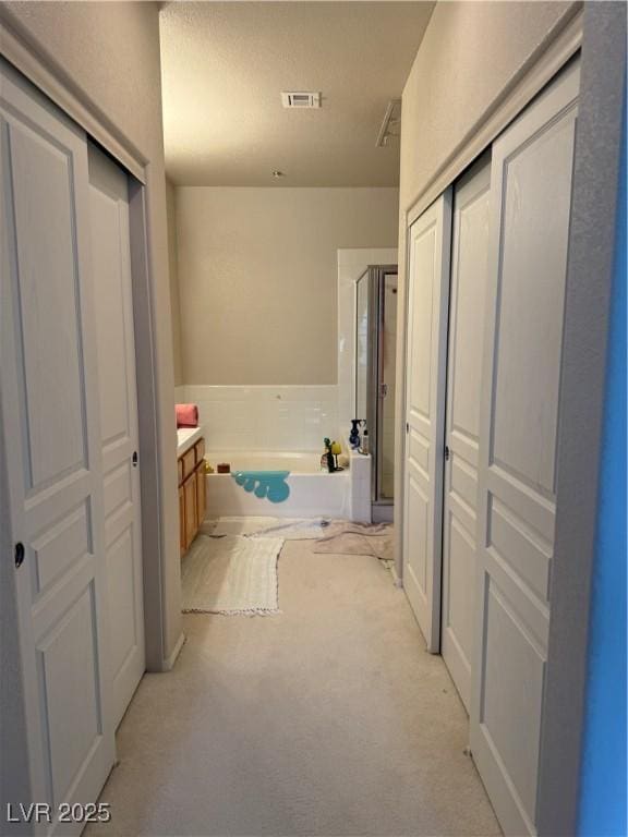 656 Peachy Canyon Cir Unit 203, Las Vegas, NV 89144 - hallway with light colored carpet