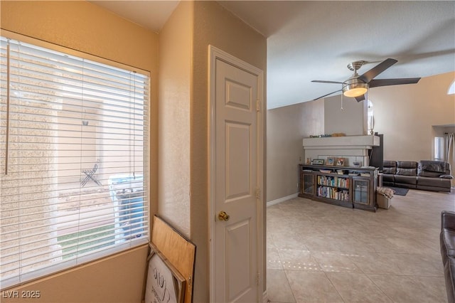 433 Jubilation Dr, Las Vegas, NV 89145 - living area with a ceiling fan and light tile patterned floors
