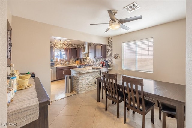 433 Jubilation Dr, Las Vegas, NV 89145 - dining room with ceiling fan and light tile patterned flooring
