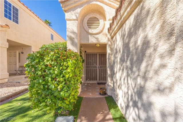 433 Jubilation Dr, Las Vegas, NV 89145 - property entrance with stucco siding