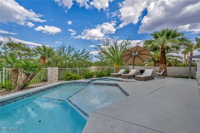2058 Troon Dr, Henderson, NV 89074 - view of pool with a patio area, a pool with connected hot tub, and an outdoor living space