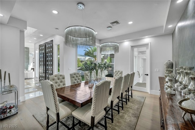 2058 Troon Dr, Henderson, NV 89074 - dining space featuring light wood finished floors and recessed lighting