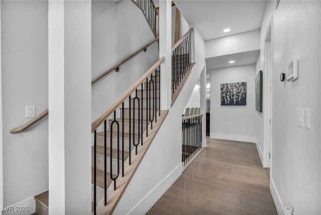 2058 Troon Dr, Henderson, NV 89074 - stairs with wood finished floors and recessed lighting