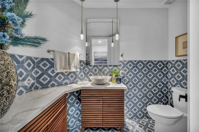 2058 Troon Dr, Henderson, NV 89074 - bathroom with vanity and wainscoting