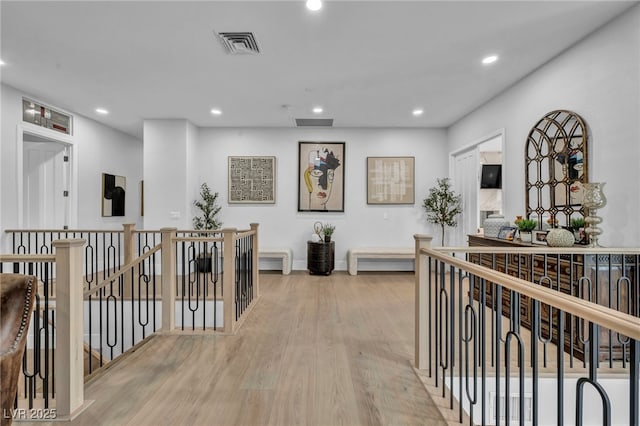 2058 Troon Dr, Henderson, NV 89074 - hallway with an upstairs landing, wood finished floors, and recessed lighting