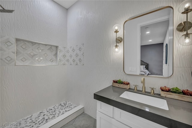 2058 Troon Dr, Henderson, NV 89074 - full bath with a tile shower, vanity, and tile patterned flooring