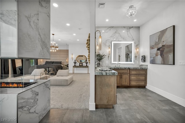 2058 Troon Dr, Henderson, NV 89074 - full bathroom with a chandelier, vanity, and recessed lighting