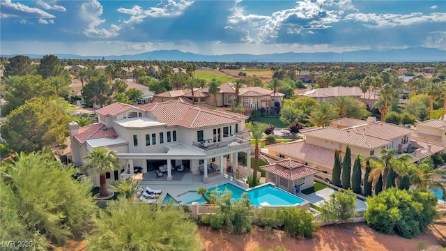 2058 Troon Dr, Henderson, NV 89074 - aerial view of residential area with a pool area and a mountainous background