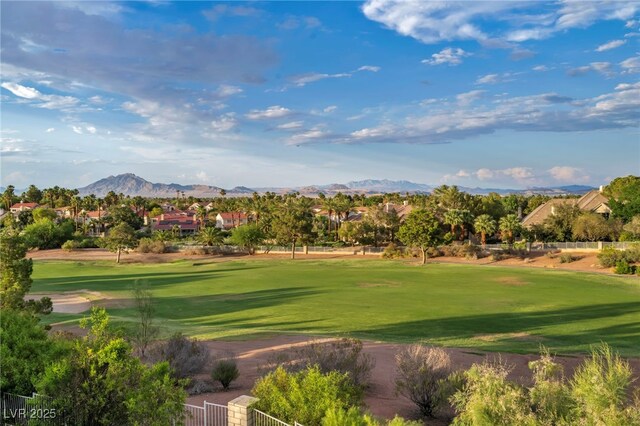 2058 Troon Dr, Henderson, NV 89074 - view of community with a mountain view, view of golf course, a lawn, and a residential view
