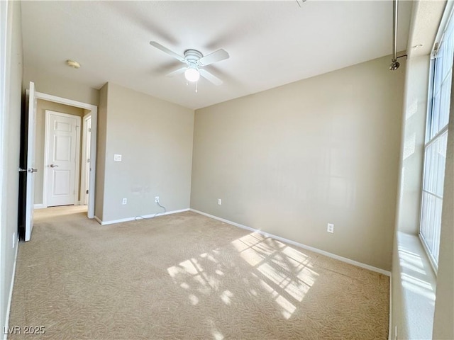 3523 Calf Roper Ct, North Las Vegas, NV 89032 - empty room featuring ceiling fan, light colored carpet, and a smoke detector