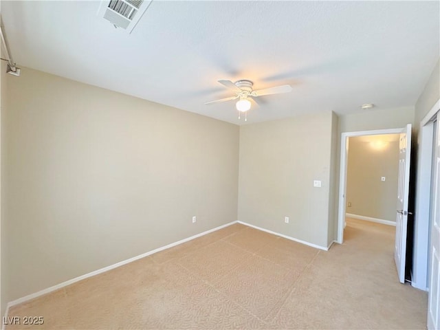 3523 Calf Roper Ct, North Las Vegas, NV 89032 - spare room featuring a ceiling fan, light colored carpet, and a smoke detector