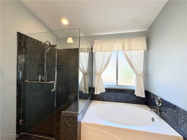 3523 Calf Roper Ct, North Las Vegas, NV 89032 - bathroom with a bath and a shower stall