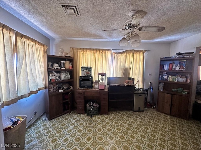 3505 W Bonanza Rd, Las Vegas, NV 89107 - office with ceiling fan and a textured ceiling