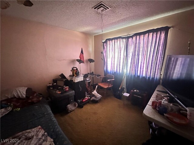 3505 W Bonanza Rd, Las Vegas, NV 89107 - carpeted bedroom with a textured ceiling