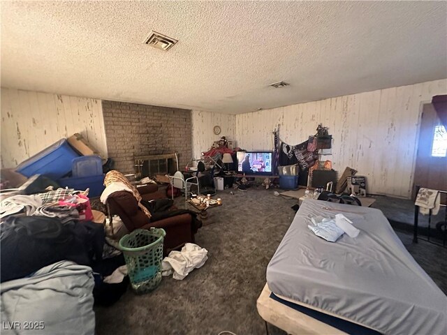 3505 W Bonanza Rd, Las Vegas, NV 89107 - miscellaneous room with a textured ceiling, carpet floors, and wooden walls