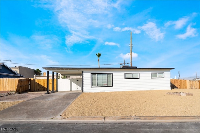 2 Utah Way, Henderson, NV 89015 - ranch-style home with concrete driveway and a carport