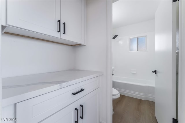 2 Utah Way, Henderson, NV 89015 - full bath featuring wood finished floors, vanity, and shower / bath combination