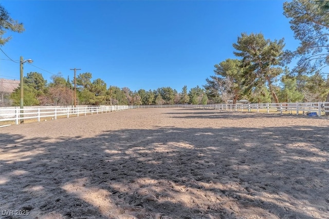 2868 Vista Del Sol Ave, Las Vegas, NV 89120 - view of yard with an enclosed riding area and a view of rural / pastoral area