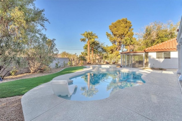 2868 Vista Del Sol Ave, Las Vegas, NV 89120 - view of pool featuring a patio, a sunroom, and a yard