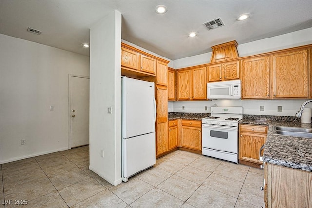 9122 Mountain Maple Ct, Las Vegas, NV 89148 - kitchen with white appliances, light tile patterned floors, and recessed lighting