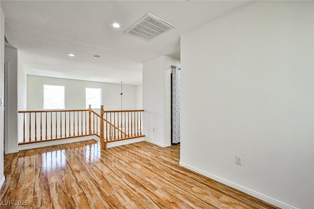 9122 Mountain Maple Ct, Las Vegas, NV 89148 - empty room with light wood-type flooring and recessed lighting