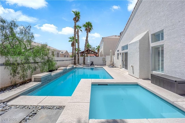 4604 Barnes Ct, Las Vegas, NV 89147 - view of swimming pool with a patio and a fenced backyard