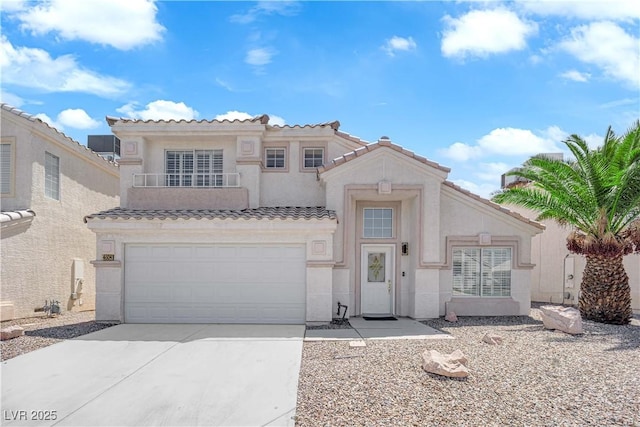 4604 Barnes Ct, Las Vegas, NV 89147 - mediterranean / spanish home featuring a tiled roof, stucco siding, concrete driveway, a garage, and a balcony