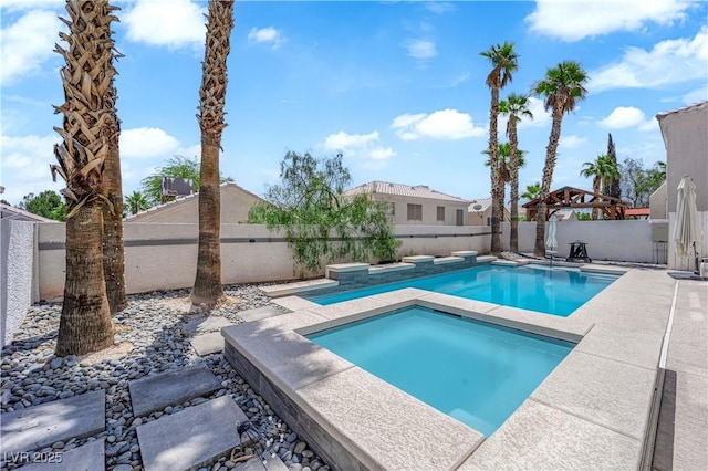 4604 Barnes Ct, Las Vegas, NV 89147 - view of pool with an outdoor hot tub, a fenced backyard, and a patio area